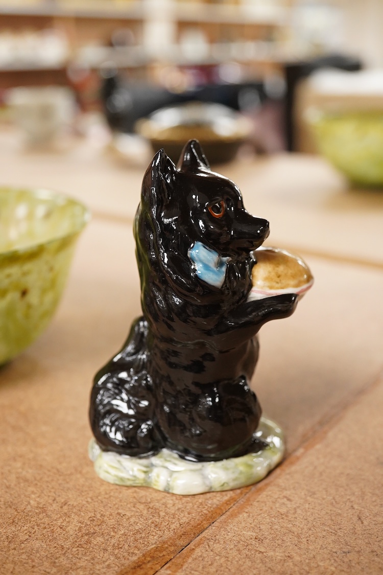 A Beatrix Potter, stamped F Warne and Co Ltd, Beswick figure of “Duchess” with pie, 10cm high.